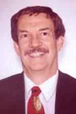 Figure 1: Leland Langston, System Engineer, Voyager Data Storage Subsystem, Texas Instruments